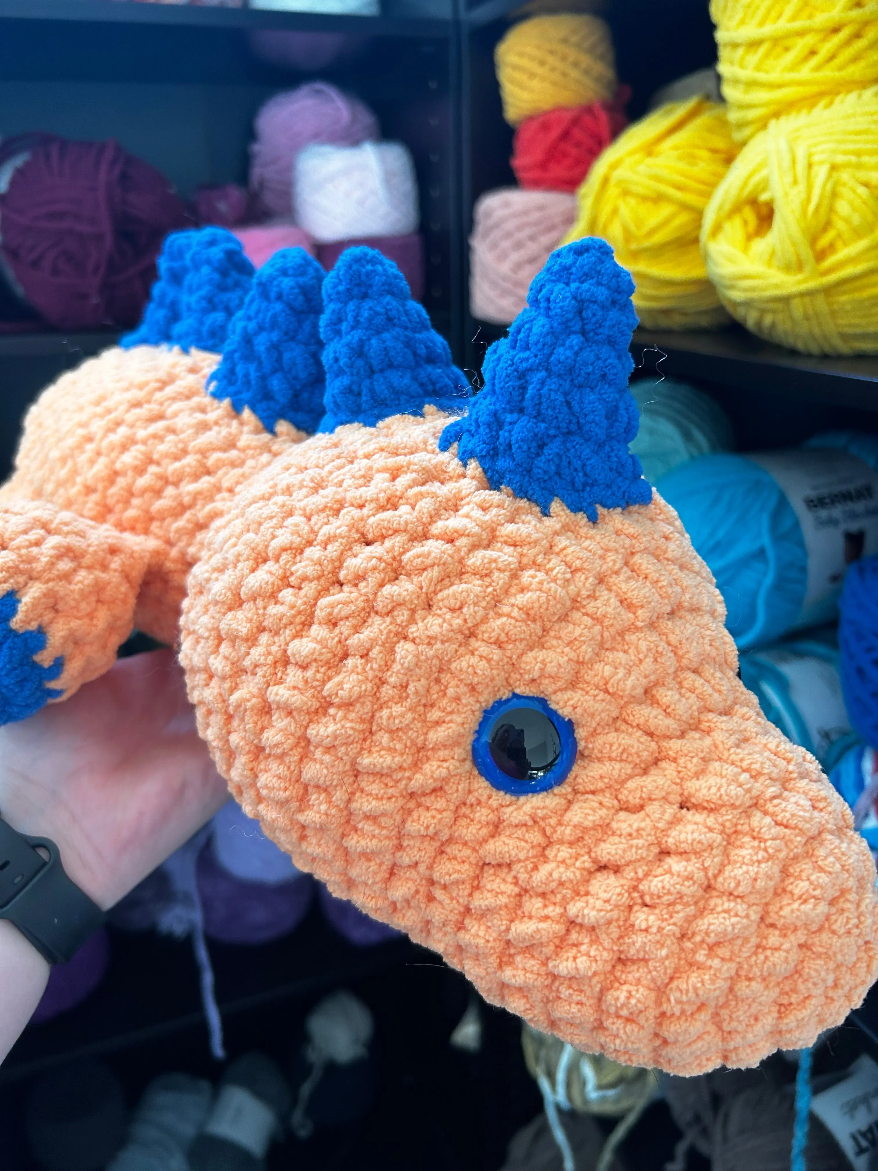 Sleeping Dinosaur Crochet Plushie - Melon/Blue